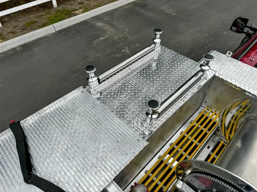 Top compartment close-up showing empty grating bay and mounting points.